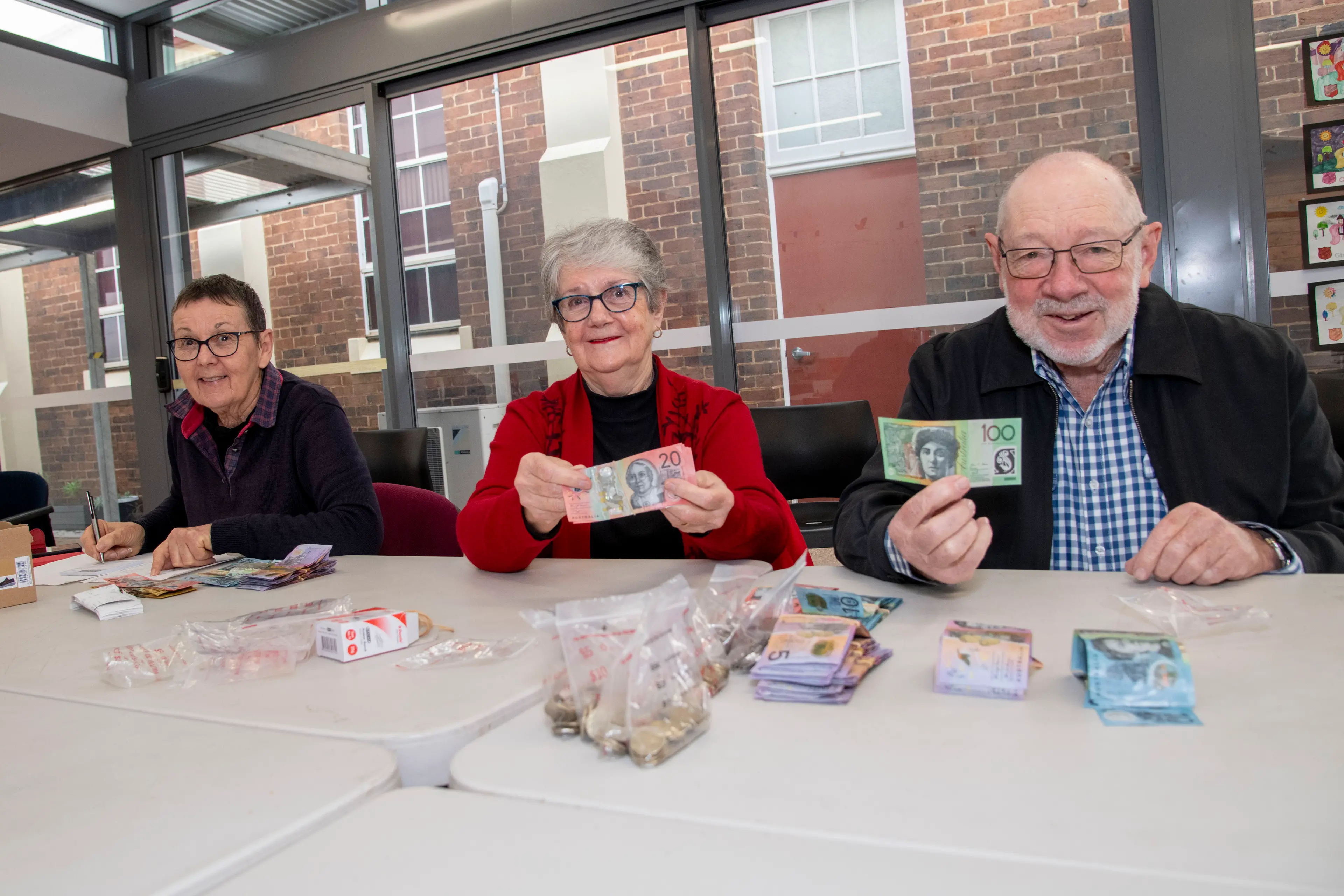 <p>Dianne Hartwig, Dorothy and Keith Anderson manning the counting house PHOTO: Noel Fisher</p>\\n