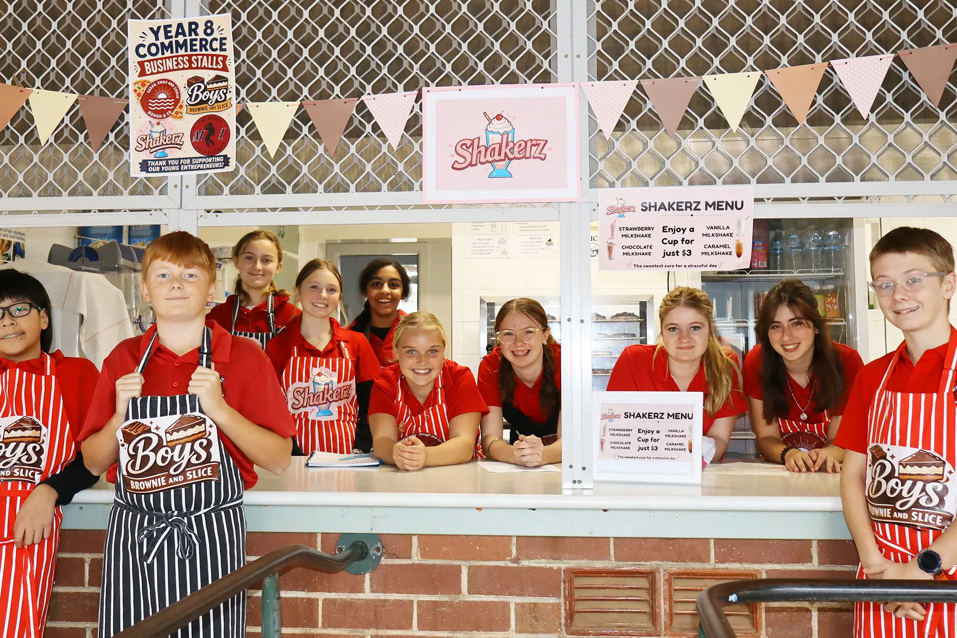 <p>Students setting up their stall</p>\\n