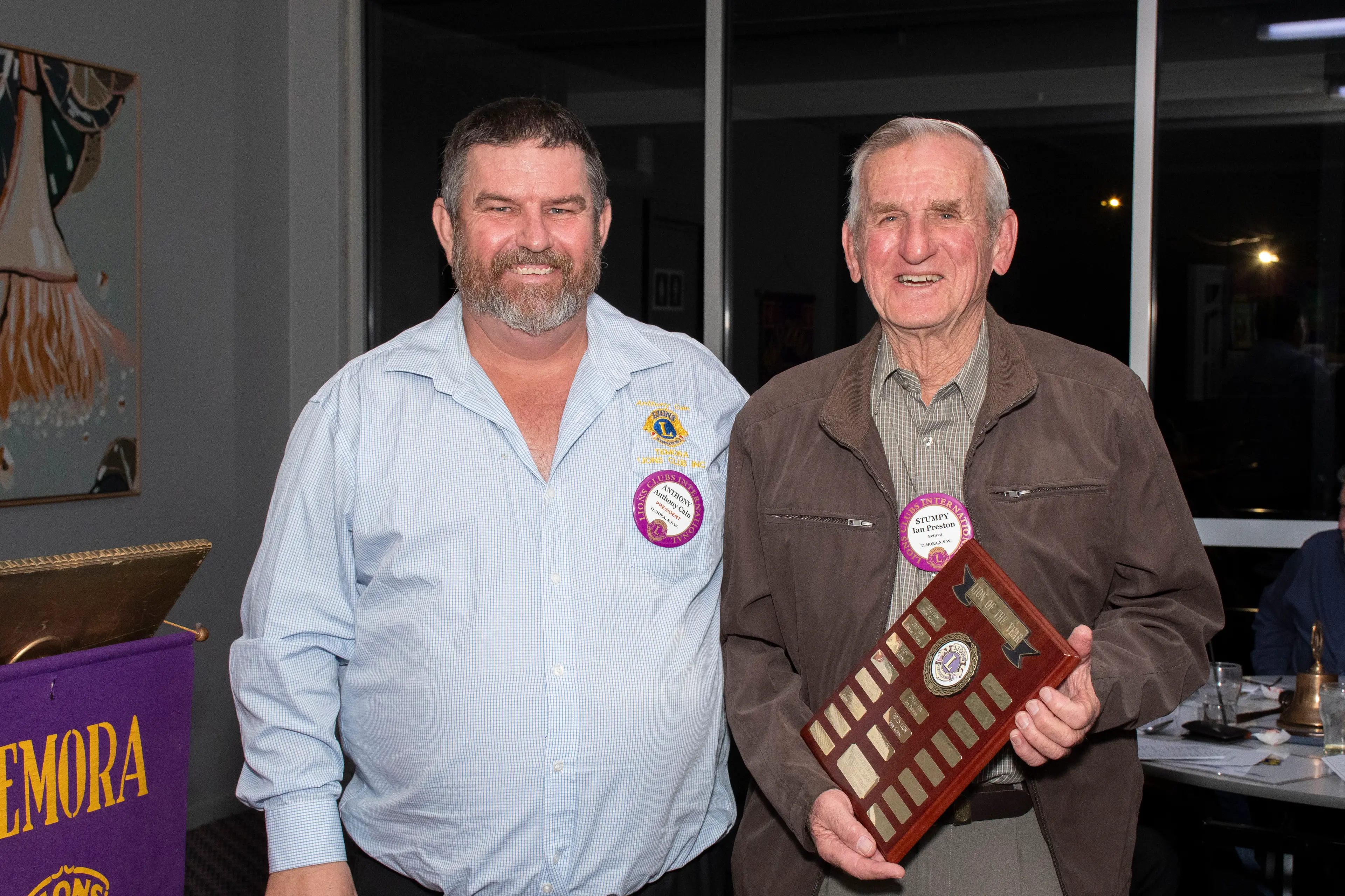 <p>Lions Club president Anthony Cain presents Lion of the Year Ian Preston with his award</p>\\n