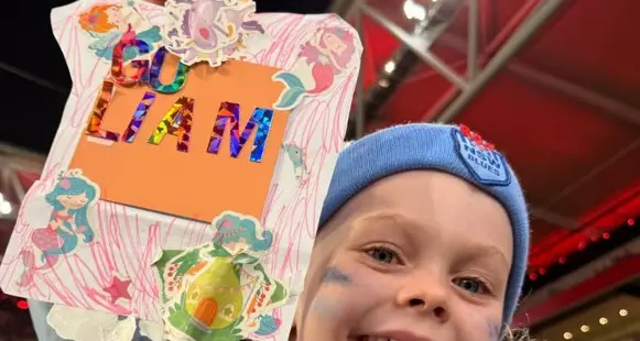Martin's biggest little fan cheers him on