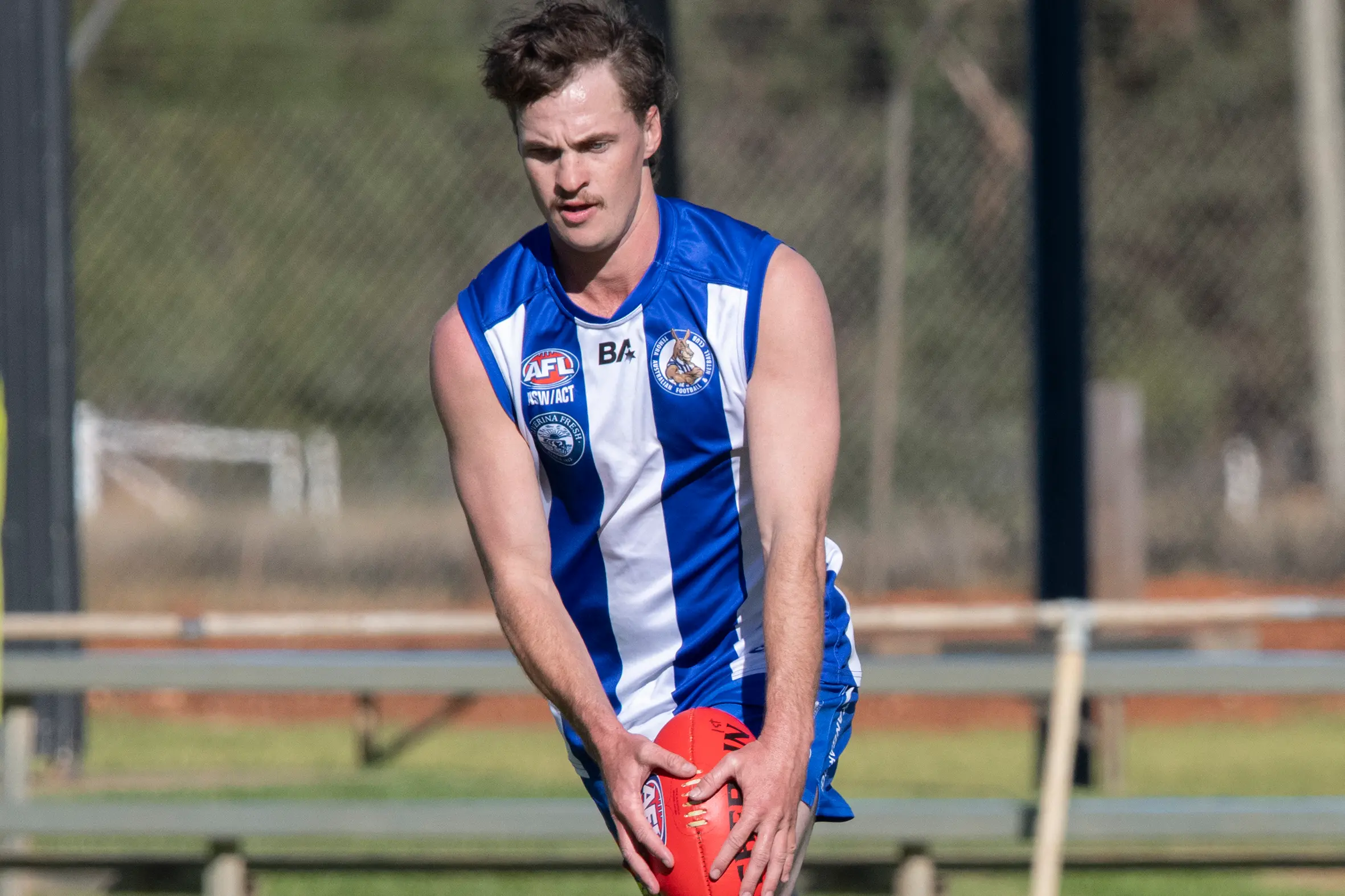 <p>Roos\\' key player Joe Morton, celebrated his 100th game against The Rock Yerong Creek Magpies last weekend. PHOTO: Noel Fisher</p>\\n