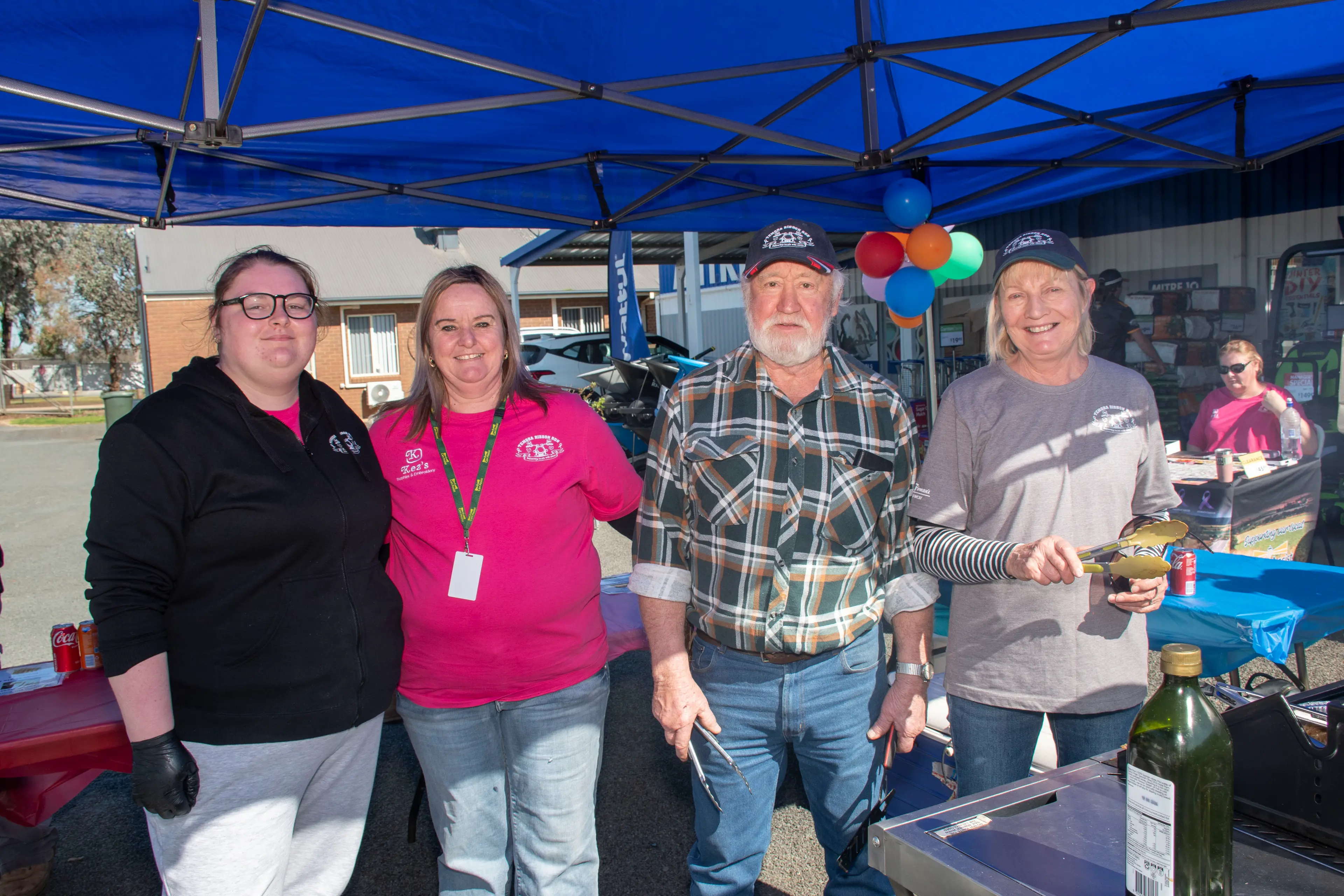 <p>Ribbon Run volunteers Brianna Loader, Kellie Neilson, Geoff and Helen Bennett manning the sausage sizzle. PHOTO: Noel Fisher</p>\\n