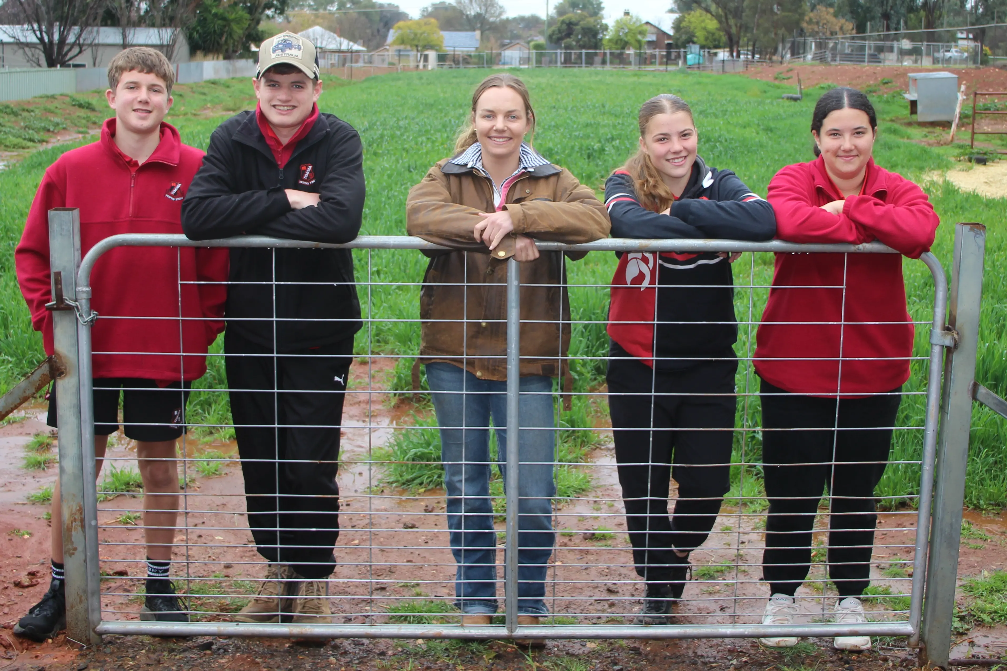<p>Temora High School students Lincoln, Cooper, Zali and Georgia out on the school farm with teacher Ms Chelsea Walker. PHOTO: Russ Haylock.</p>\\n