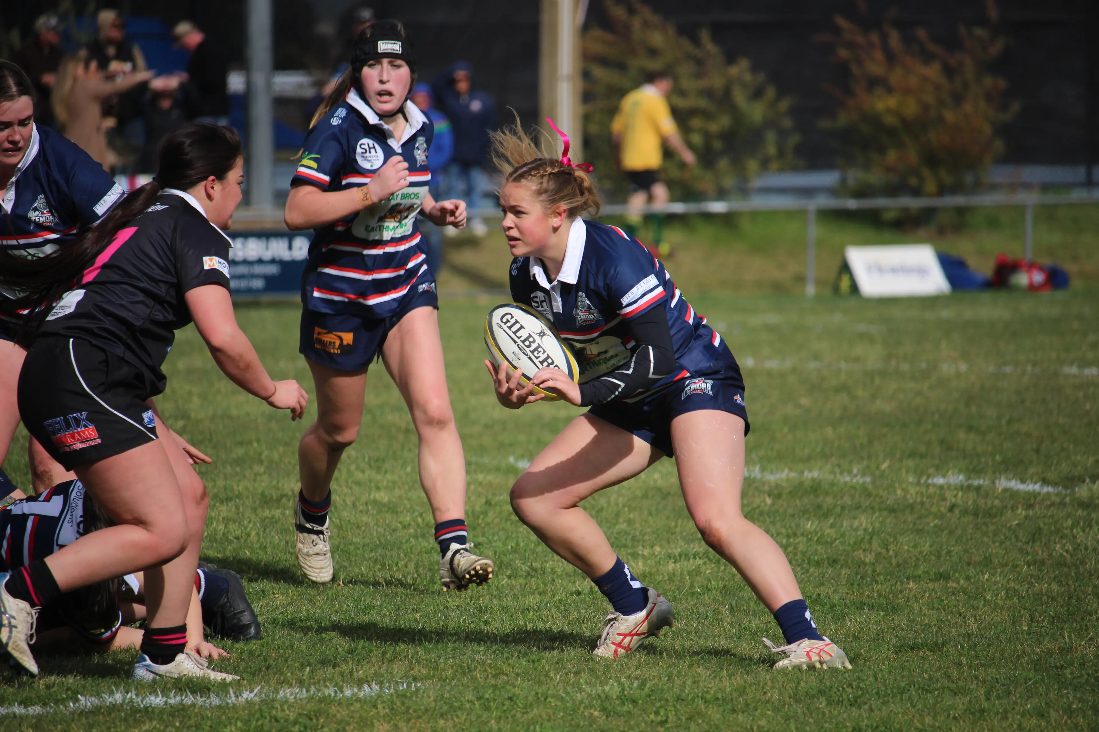 <p>Emma Seaman sizes up the Grenfell defenders with Maddie Miller in support. PHOTO: Russ Haylock</p>\\n