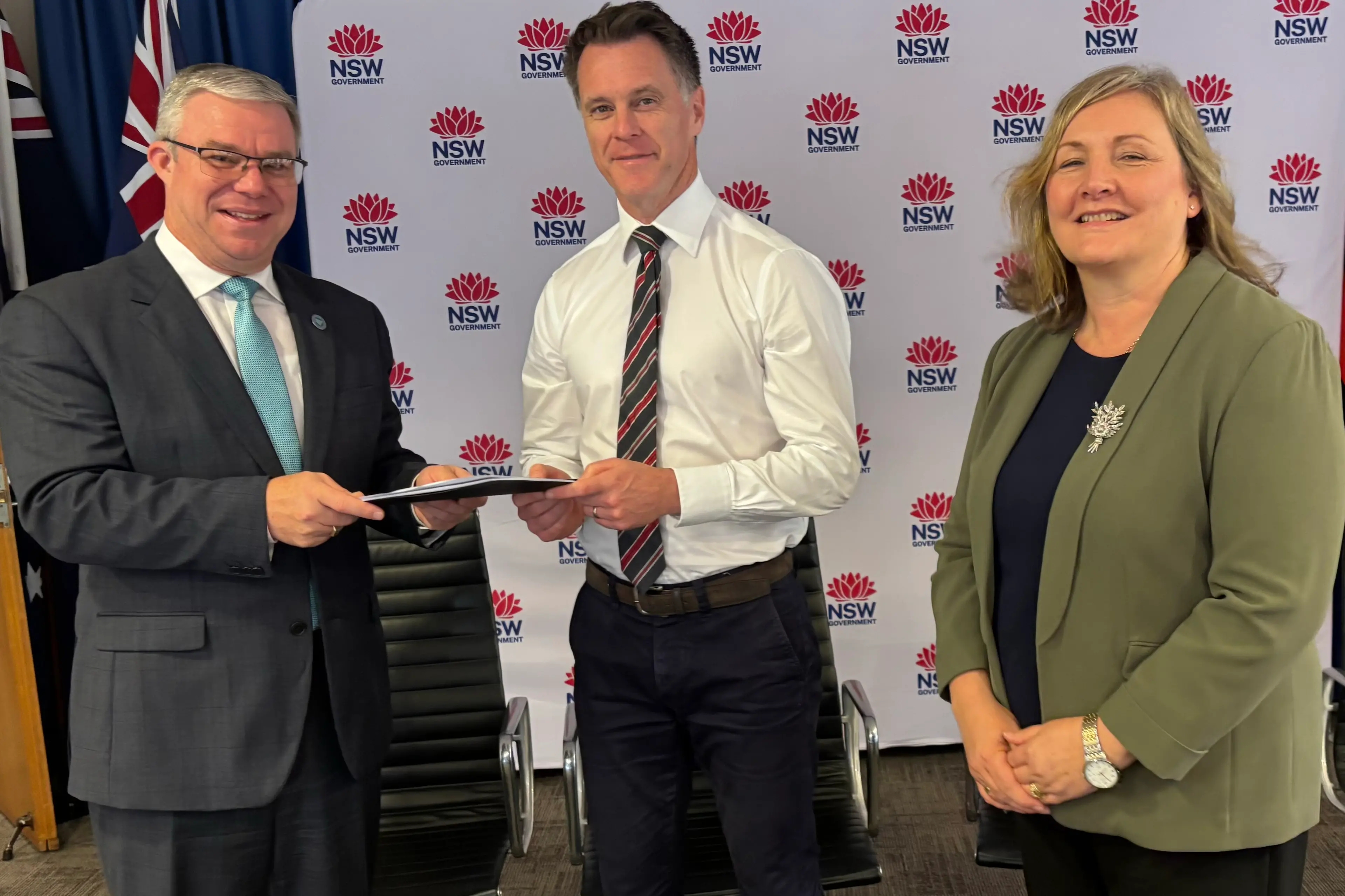 <p>Pictured are NSW Premier \\u2013 Chris Minns MP receiving the Premier\\u2019s Remote, Rural and Regional Advisory Council\\u2019s (PRRRAC) Housing Report and recommendations from Mayor Rick Firman (Co-Chairman of PRRRAC) and Housing Working Party Lead Jane Laverty.</p>\\n