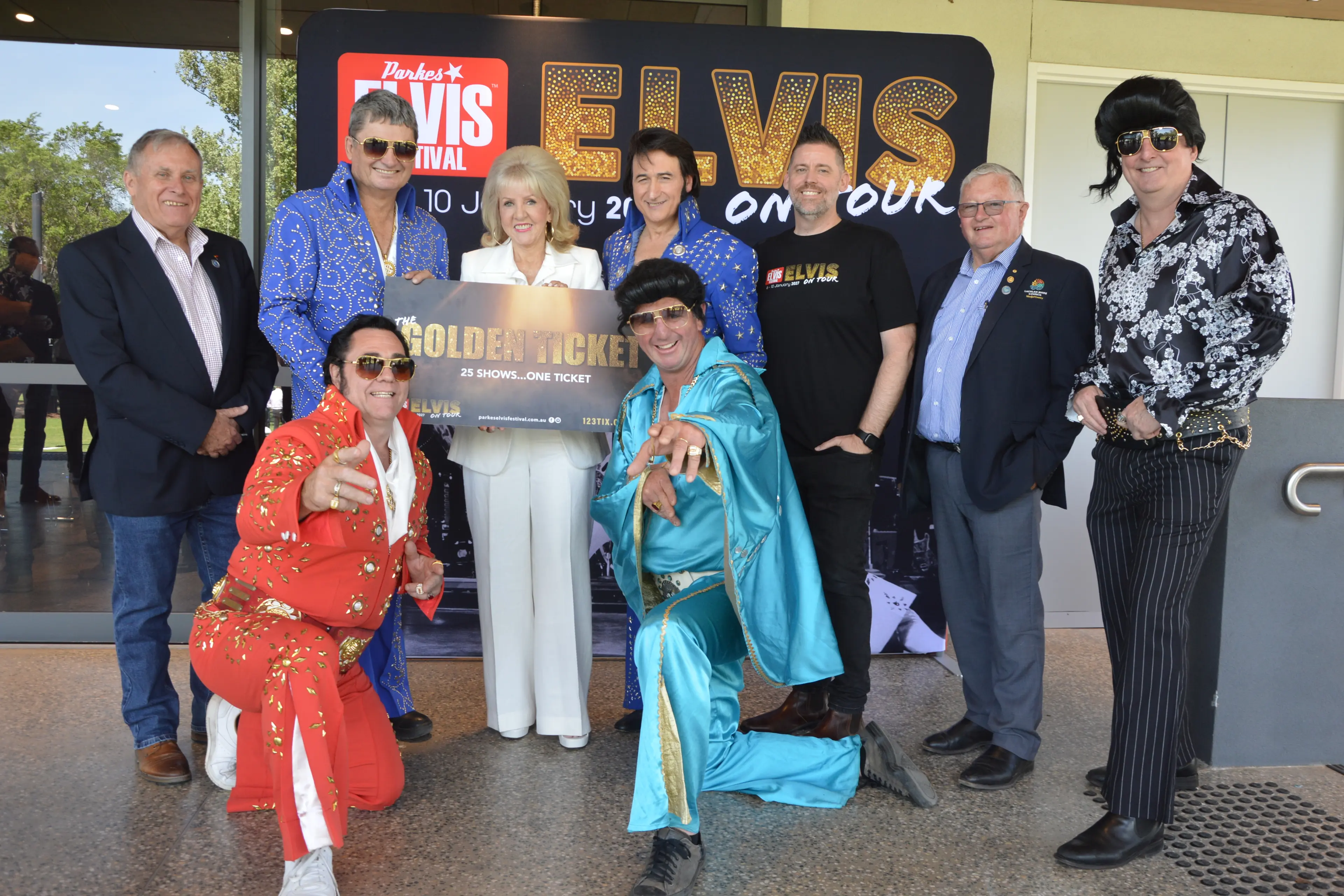 <p>At the Parkes Elvis Festival program launch with the Golden Ticket, Forbes deputy mayor Chris Roylance, Parkes Mayor Neil Westcott, Parkes deputy mayor Joy Paddison, ETA Paul Fenech, Elvis Festival director Brendan Shipley, Lachlan Shire Mayor John Medcalf, and Parkes Shire Council director Anthony McGrath; front, Tony Mark and Dooley Thompson. PHOTOS: Christine Little</p>\\n